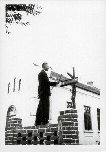 Pastor Georgi Stefanov summoning people to a religious service, the village of Golintsi, 1930s.