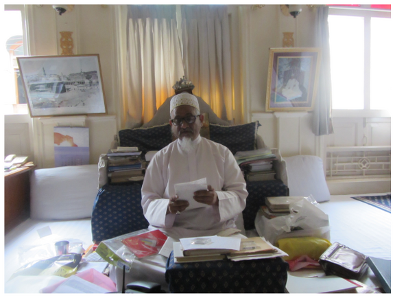 Figure 13.11: The Dāʿī copying, storing, and reading his awrāq in the treasury of books. The clerics use the historic collection of awrāq for inspiration and as reference for their sermons.