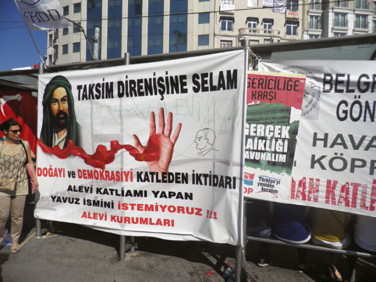 Alevi posters opposing the naming of the Yavuz Sultan Bridge and supporting environmental protectionism and pluralistic democracy. Taksim Square, Istanbul