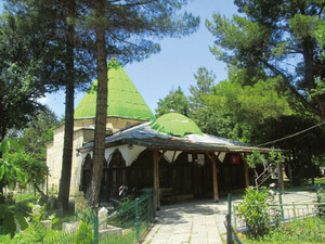 Entrance, façade and green domes of the shrine of Abdal Musa