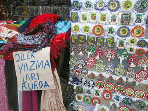 Magnets and votive kerchiefs (dilek yazmaları) offered for sale at the festival booths around the Abdal Musa shrine complex