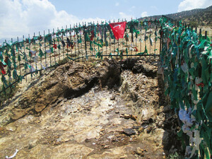 Abdal Musaâs rock-throne covered in the wax run-off of votive candles