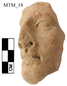 Figure A102: Fragment of male head (inv. N. 232366; by permission of the Polo Museale dellâUmbria).