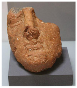 Figure A143: Fragment of a head (left) and veiled head (right) (inv. NN. 305632 and 305652).