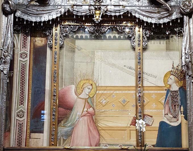 Fresco of the Virgin of the Annunciation with the archangel Gabriel in the church of Santa Annunziata in Florence.