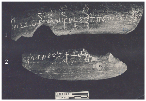 Two potsherds grey in color.