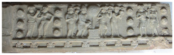 A cornice divided into registers by columns of lotus medallions. It depicts a tree shrine surrounded by four attendants at the center and amorous couples on both sides.