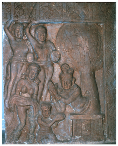 It depicts a tree spirit worshipping the Bodhisattva, who is symbolically represented as a set of footprints on a cloth held by his mother. Two male figures are depicted behind the Buddhaâs mother.