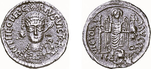 Gold tremissis minted c. 540/8 in Bonn, Germany, weighing 4.41 g and measuring 21 mm in diameter. The obverse shows a facing bust of Theudebert I with a spear resting on his right shoulder, surrounded by the inscription âD N THEODEBERTVS VICTORâ. The reverse depicts Victory standing facing, holding a long cross and a cruciger globe, with the inscription âVICTORIA AVCCCCI BO COM OBâ.