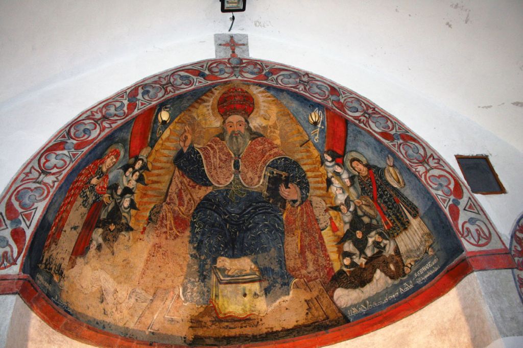 Apsidal wall painting showing a divine figure enthroned behind an altar bearing the Lamb, glorified by angels and approached by the Virgin Mary (left) and St Stephen (right).