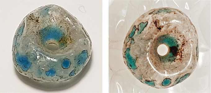 Bead NAM P4707.6 with a greenish-blue deposit on the surface and in the hole. The beadâs diameter is 6.5 mm. The same bead is shown in Figure 11 (no. 6 from left).