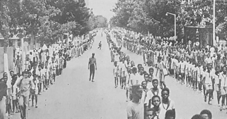 JMPLA and OPA march on 14 April 1978 in Luanda, commemorating the memory of its patron Hoji ya Henda. The headline in the publication reads “Sigamos o exemplo do Comandante Henda na Construção da Pátria Socialista!”